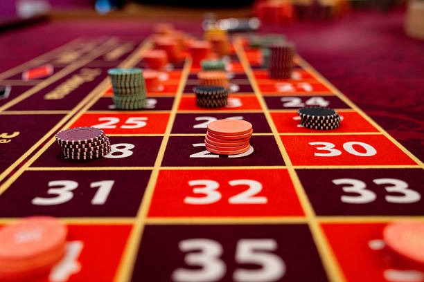 Live game show dealer studio interface visible on slotbola88 mobile app with multi-camera feed